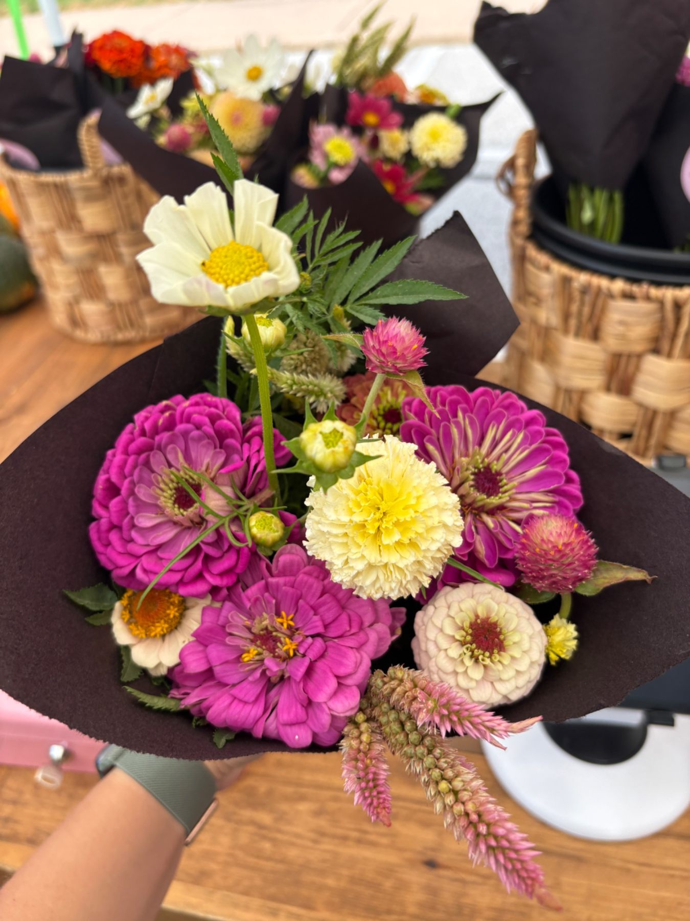 Seasonal bouquets with purple zinnias